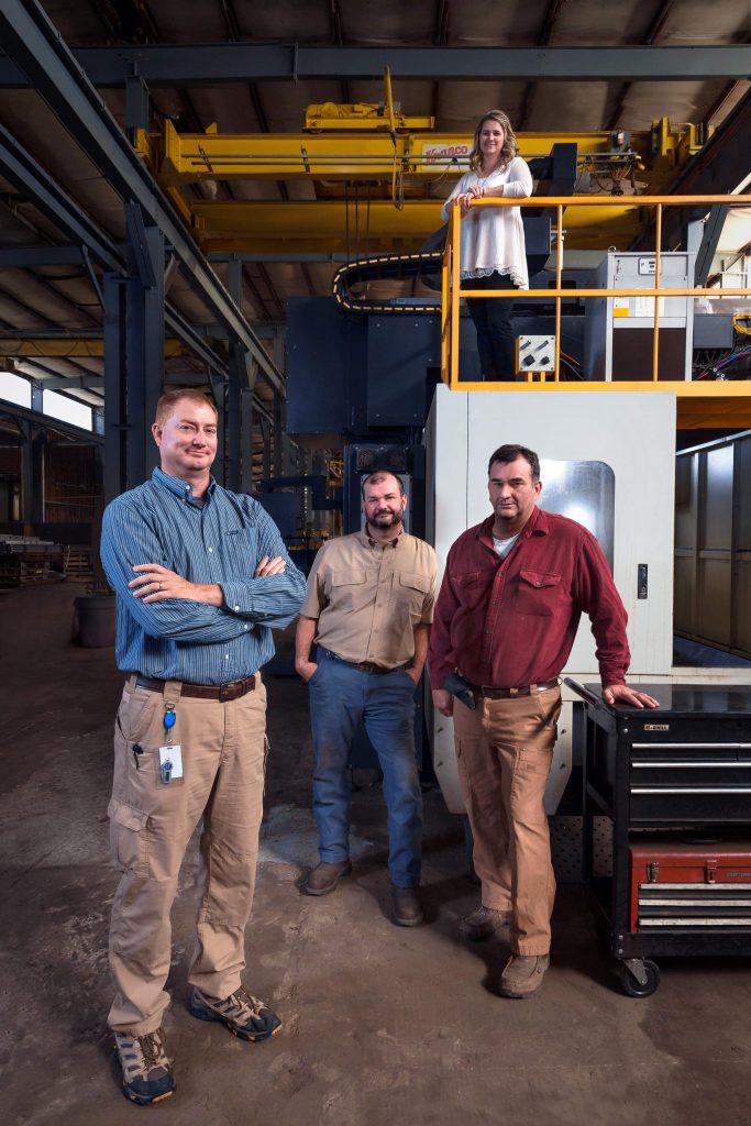 A&A Machine & Welding team standing in workshop with Steven Puckett